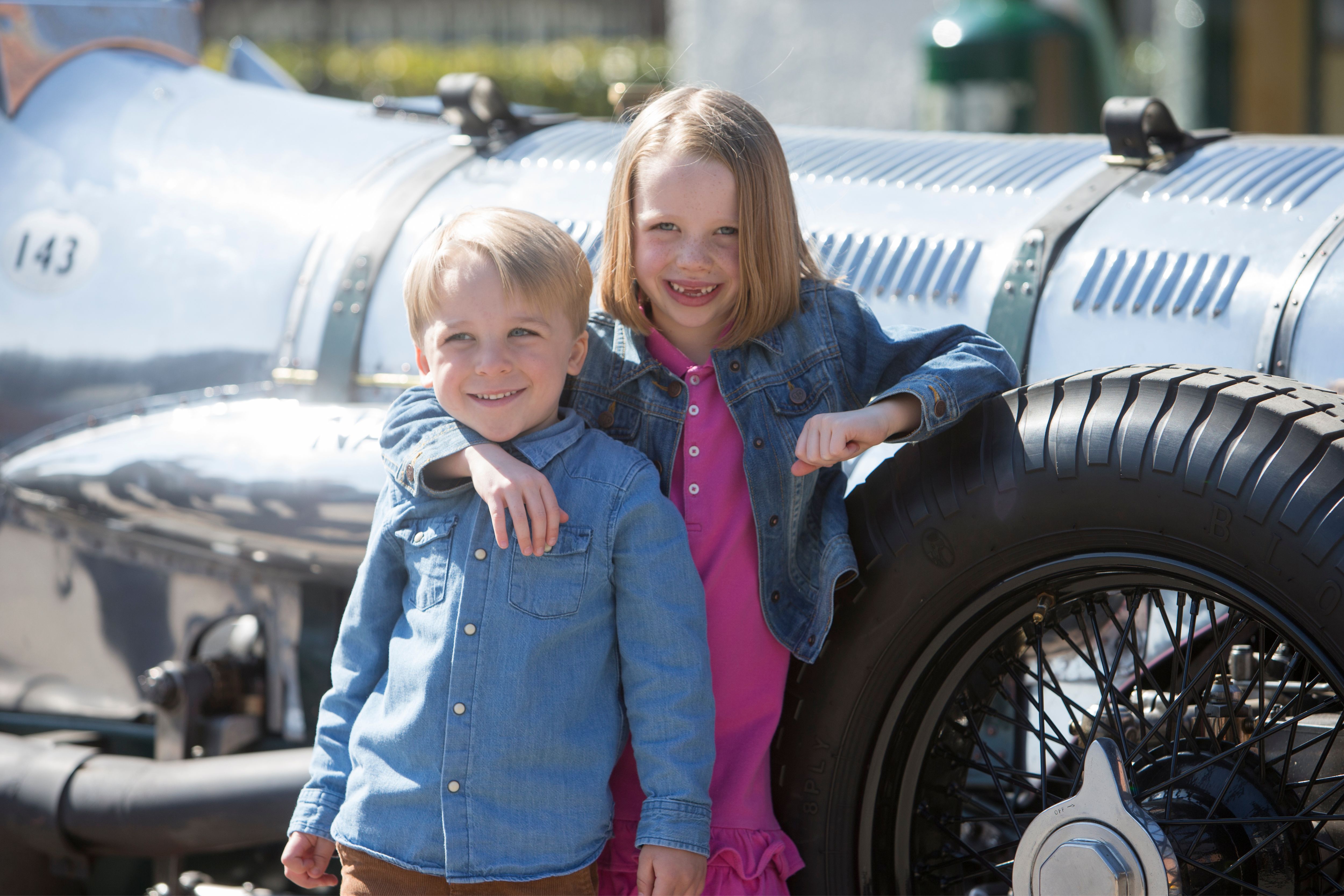 Brooklands Museum May Half Term Children by the side of Napier